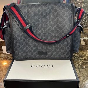 Gucci supreme diaper bag